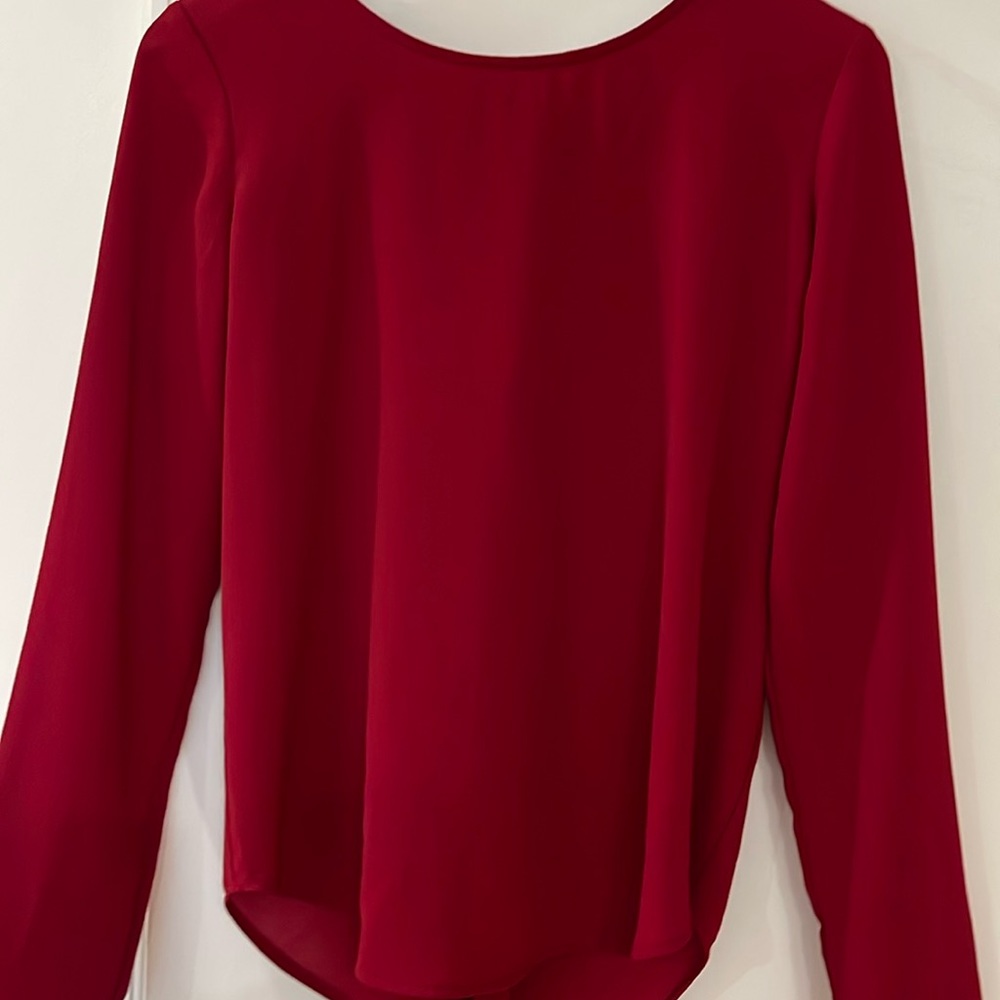 Beautiful light shirt. Size M  wonderful back detail